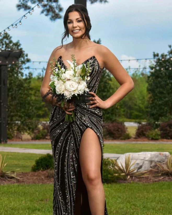 Model wearing a dark gown