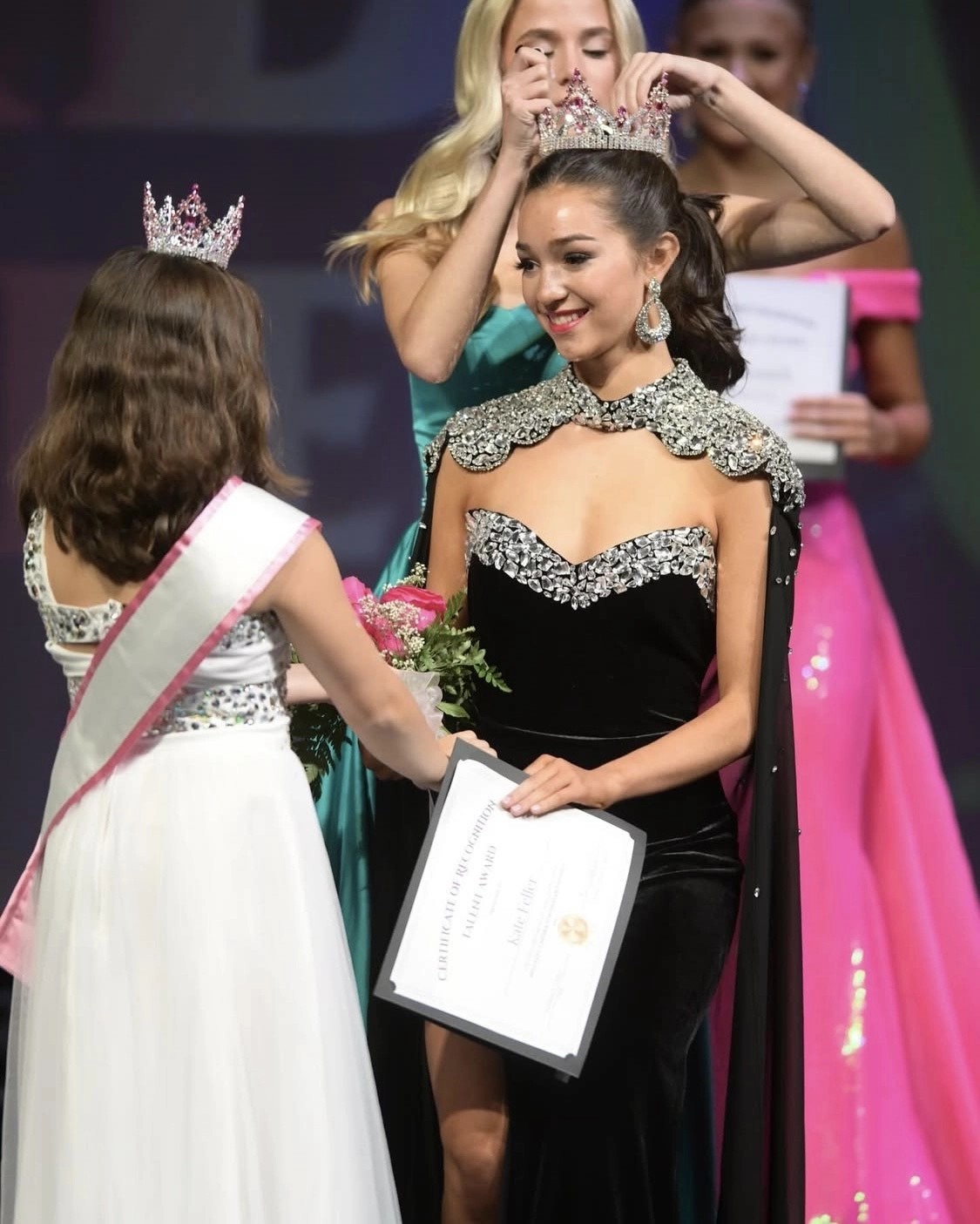 Model wearing a black gown
